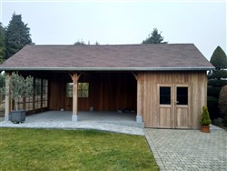 Maatwerk tuinhuis in hoevestijl met zadeldak